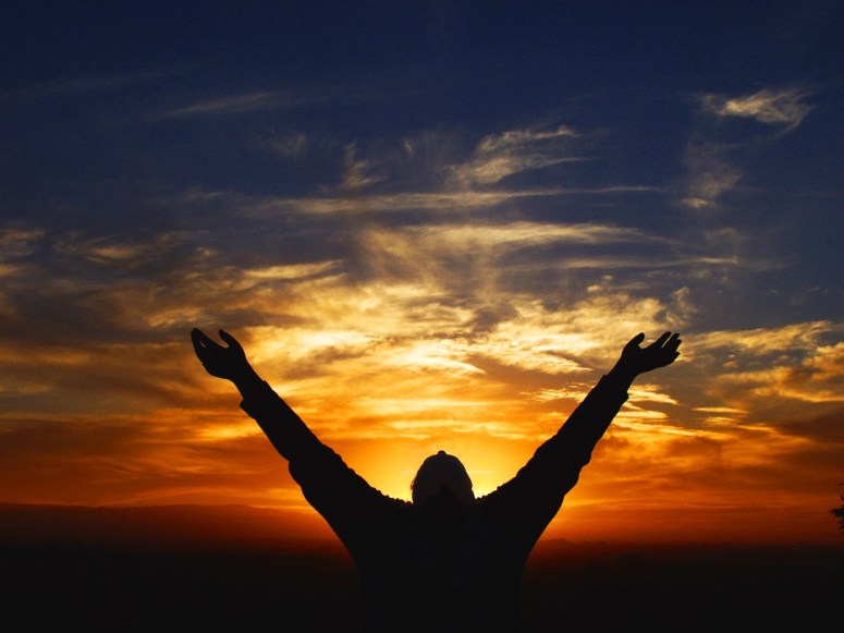 men-raise-hands-to-worship-God